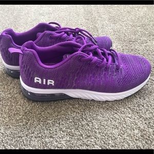 Purple running shoes